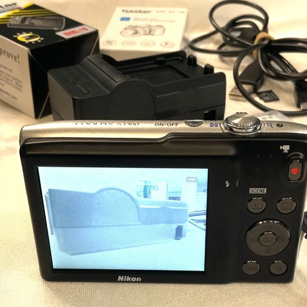 Nikon Coolpix Silver Camera with Accessories